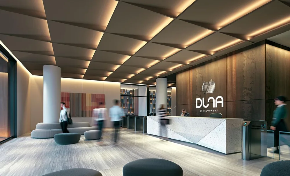 Commercial lobby with reception desk and access turnstiles